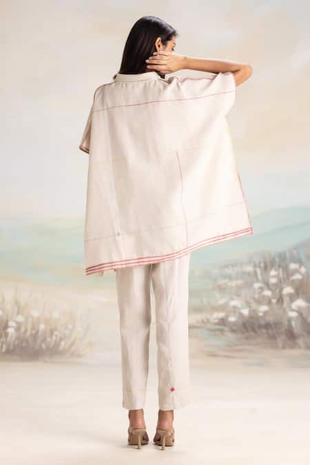 Shop Kaveri Beige Linen V-neck Dove Top And Pant Set at Aza Fashions Shop_Kaveri_Beige Linen V-neck Dove Top And Pant Set _at_Aza_Fashions