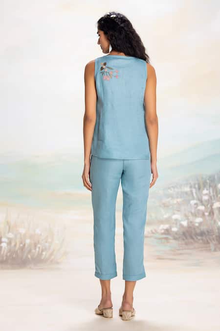 Shop Kaveri Blue Linen Applique, Embroidery Round Neck Asymmetrical Top And Pant Set at Aza Fashions Shop_Kaveri_Blue Linen Applique, Embroidery Round Neck Asymmetrical Top And Pant Set _at_Aza_Fashions