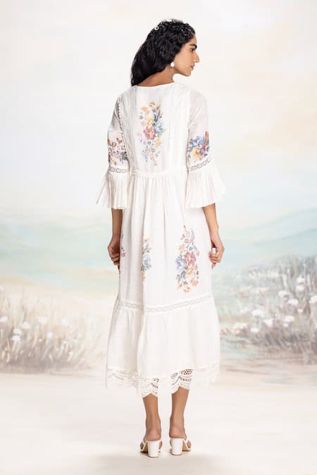 Shop Kaveri White Linen Lace V-neck Floral Insert Midi Dress at Aza Fashions Shop_Kaveri_White Linen Lace V-neck Floral Insert Midi Dress _at_Aza_Fashions