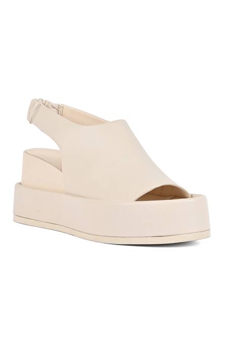 Jvam_Ivory Minimalist Leather Inset Footbed Wedges_Online_at_Aza_Fashions