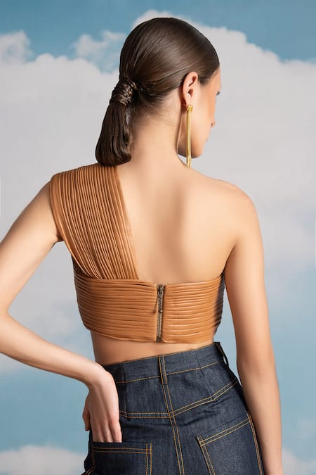 Shop Nikita Mhaisalkar Beige Faux Leather Asymmetric One Shoulder Pleated Bralette at Aza Fashions Shop_Nikita Mhaisalkar_Beige Faux Leather Asymmetric One Shoulder Pleated Bralette _at_Aza_Fashions