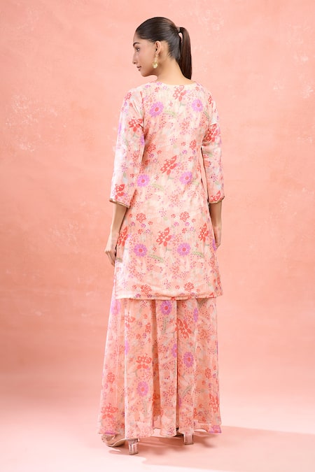 Shop Naintara Bajaj Peach Georgette Embroidery Round Neck Floral Digital Print Kurta Set at Aza Fashions Shop_Naintara Bajaj_Peach Georgette Embroidery Round Neck Floral Digital Print Kurta Set _at_Aza_Fashions