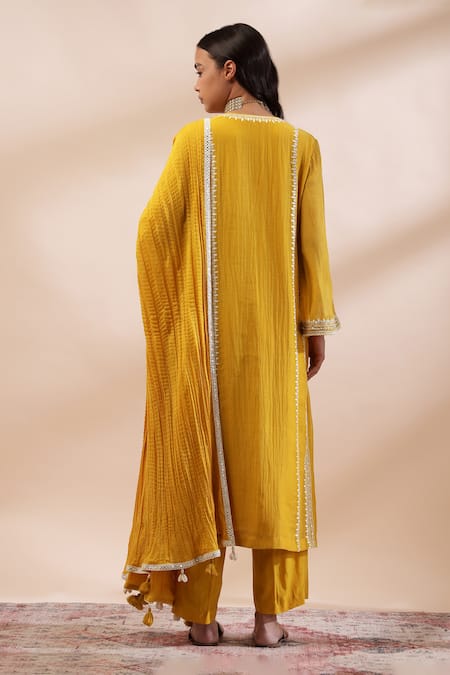 Shop Kyra By Bhavna Mustard Chanderi Silk, Cotton Lace V-neck Yellow A-line Kurta Set at Aza Fashions Shop_Kyra By Bhavna_Mustard Chanderi Silk, Cotton Lace V-neck Yellow A-line Kurta Set _at_Aza_Fashions