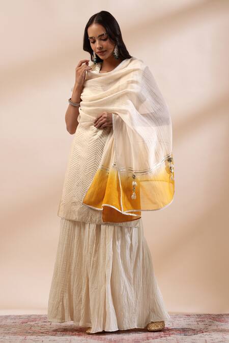 Buy_Kyra By Bhavna_Ivory Chanderi Silk, Cotton Lace, Tassels V-neck Textured Sharara Set _Online_at_Aza_Fashions