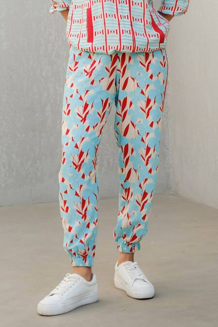 Pooja Rajgarhia Gupta Blue Georgette Round Neck, Collared Floral Print Top And Track Pant Set Online at Aza Fashions Pooja Rajgarhia Gupta_Blue Georgette Round Neck, Collared Floral Print Top And Track Pant Set _Online_at_Aza_Fashions