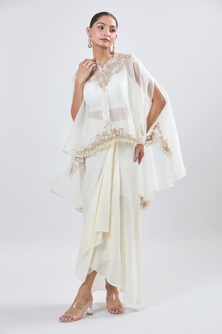 Shop_Prisho_Ivory Embroidery Round Neck Cape And Draped Skirt Set _Online_at_Aza_Fashions