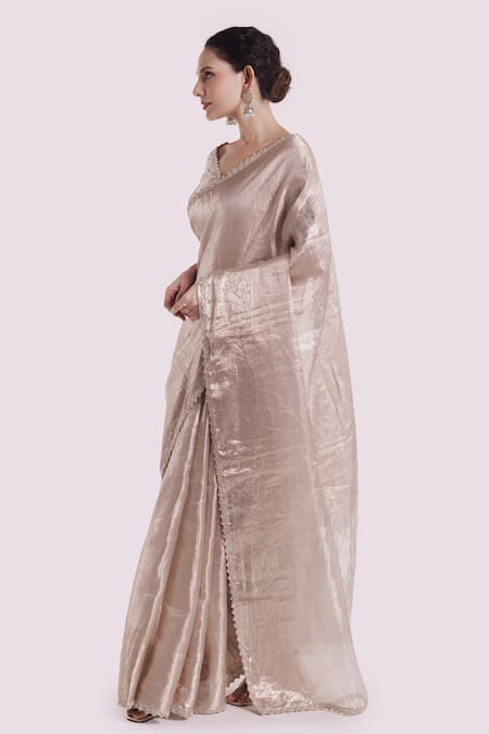 Shop Onaya Silver Tissue Cut Work V-neck Embellished Saree With Blouse Online at Aza Fashions Shop_Onaya_Silver Tissue Cut Work V-neck Embellished Saree With Blouse _Online_at_Aza_Fashions