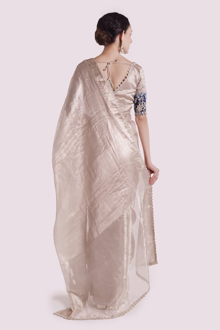 Shop Onaya Silver Tissue Cut Work V-neck Embellished Saree With Blouse at Aza Fashions Shop_Onaya_Silver Tissue Cut Work V-neck Embellished Saree With Blouse _at_Aza_Fashions