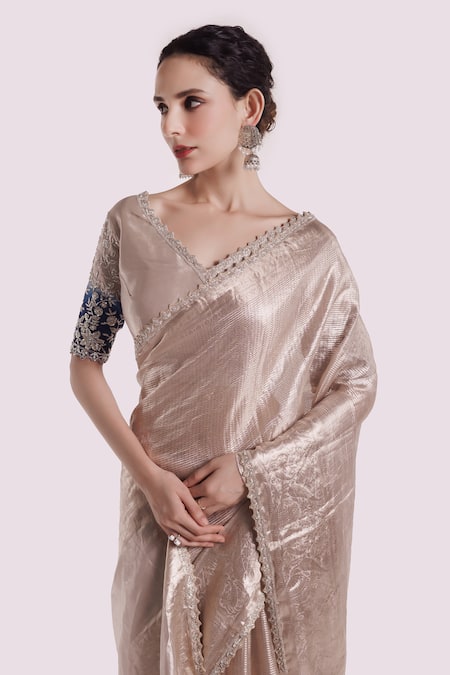 Onaya Silver Tissue Cut Work V-neck Embellished Saree With Blouse at Aza Fashions Onaya_Silver Tissue Cut Work V-neck Embellished Saree With Blouse _at_Aza_Fashions