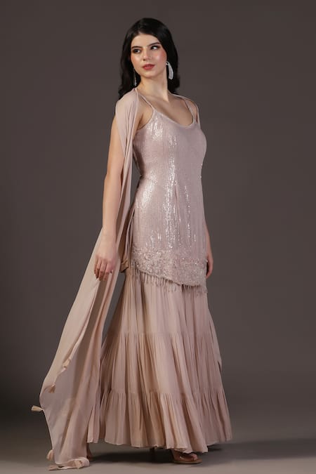 Shop Two Sisters By Gyans Pink Georgette Sequins Round Neck Dusky Kurta Gharara Set Shop_Two Sisters By Gyans_Pink Georgette Sequins Round Neck Dusky Kurta Gharara Set