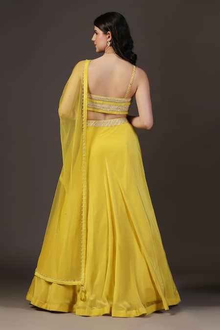 Shop_Two Sisters By Gyans_Yellow Crepe Sequins, Beads Sweetheart Neck Designer Lehenga Set _at_Aza_Fashions