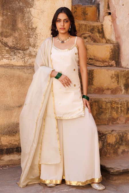 Buy_Bannhi By Priyanka Rathore_Ivory Crepe Zari Round Neck Kurta Sharara Set _Online_at_Aza_Fashions