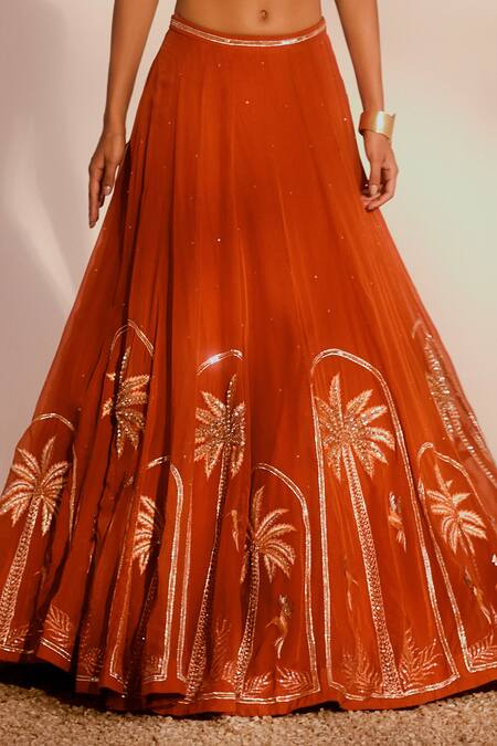 Silky Bindra_Rust Organza Sequins, Embroidery, Zari Plunge Neck Palm Paradise Lehenga Set _at_Aza_Fashions