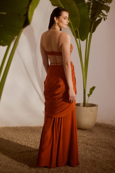 Shop_Silky Bindra_Rust Crepe Beads, Sequins Sweetheart Neck Koa Draped Skirt And Blouse Set _at_Aza_Fashions