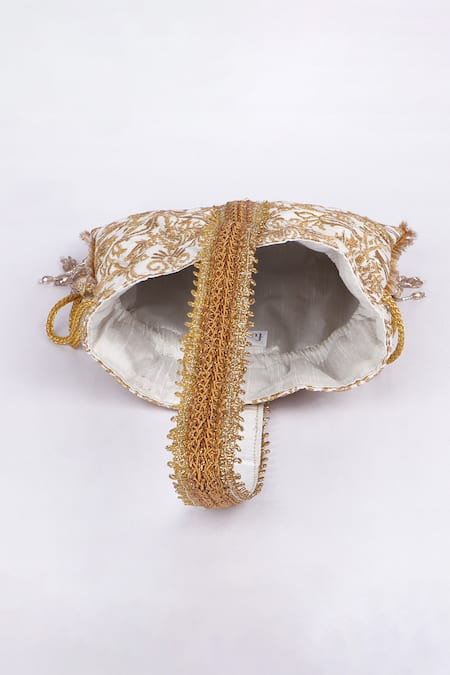 Buy_Fuchsia_Ivory Embroidery, Tassels Designer Potli Bag _Online_at_Aza_Fashions