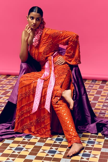 Shop Anushka Khanna Orange Silk Sequins Asymmetric Burnt Hand Embroidered Kurta Set at Aza Fashions Shop_Anushka Khanna_Orange Silk Sequins Asymmetric Burnt Hand Embroidered Kurta Set_at_Aza_Fashions