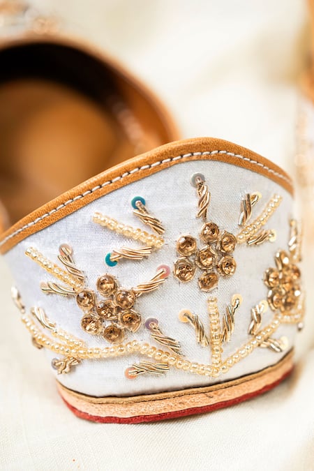 Buy_Loryphilory_White Floral Embroidered Gold Jutti _Online_at_Aza_Fashions