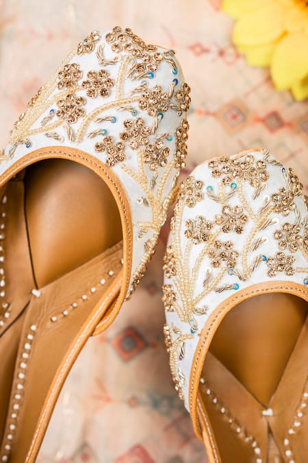 Shop_Loryphilory_White Floral Embroidered Gold Jutti _at_Aza_Fashions