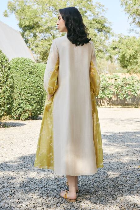 Shop_Vaayu_Beige Muslin, Cotton Embroidery Round Neck Floral Midi Dress _at_Aza_Fashions