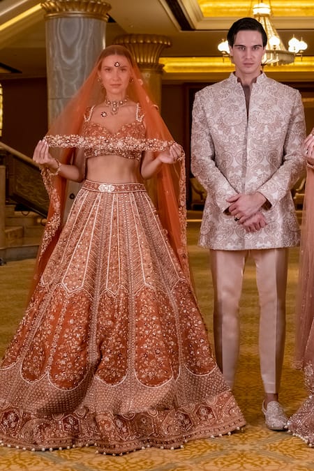 Shop_Jigar & Nikita_Rust Silk, Velvet, Net Embroidery, Zari Ochre Lehenga Set _Online_at_Aza_Fashions