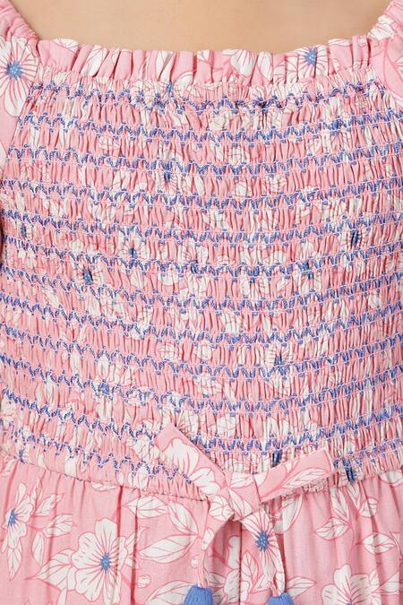 Buy_Petite Pomme_Pink Rayon Bows Floral Smocking Jumpsuit With _Online_at_Aza_Fashions