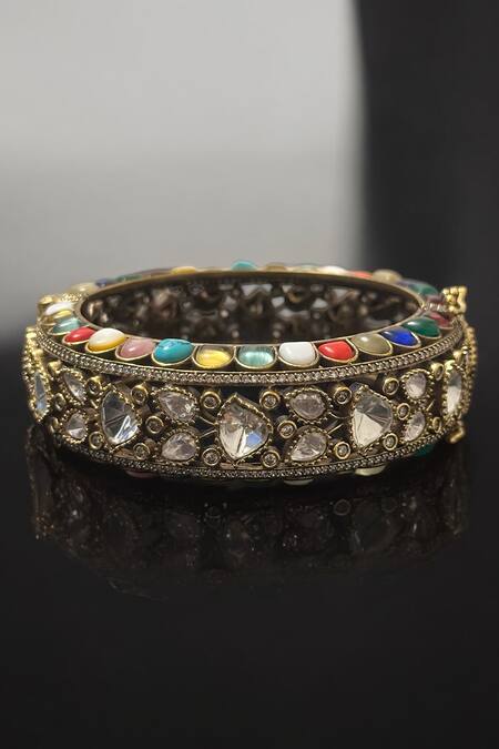 Buy Amaara Jewels Gold Plated Stones Antique Navratan Designer Bracelet Online at Aza Fashions Buy_Amaara Jewels_Gold Plated Stones Antique Navratan Designer Bracelet _Online_at_Aza_Fashions