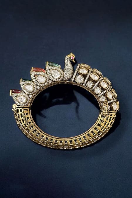 Shop Amaara Jewels Gold Plated Diamonds, Stones Antique Moissanite Peacock Bangle at Aza Fashions Shop_Amaara Jewels_Gold Plated Diamonds, Stones Antique Moissanite Peacock Bangle _at_Aza_Fashions