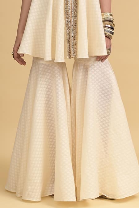 Rishi and Vibhuti_Ivory Cotton Embroidery V-neck Designer Peplum Kurta And Sharara Set _at_Aza_Fashions