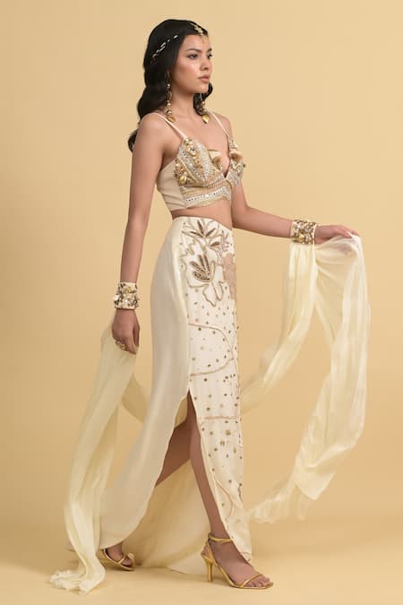 Buy Rishi and Vibhuti Ivory Cotton, Georgette Beads, Sequins, Embellished Bralette Skirt Cape Set Online at Aza Fashions Buy_Rishi and Vibhuti_Ivory Cotton, Georgette Beads, Sequins, Embellished Bralette Skirt Cape Set _Online_at_Aza_Fashions