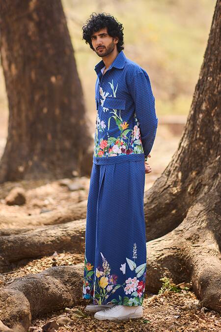 Nirmooha_Blue Denim The Artisan Flared Pants With Floral Print _Online_at_Aza_Fashions