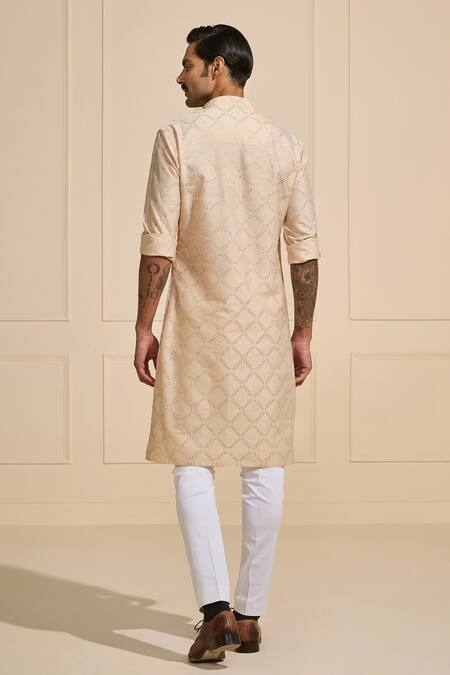 Shop Raghavendra Rathore Jodhpur Beige Cotton Embroidery Symmetric Elegance Kurta at Aza Fashions Shop_Raghavendra Rathore Jodhpur_Beige Cotton Embroidery Symmetric Elegance Kurta _at_Aza_Fashions