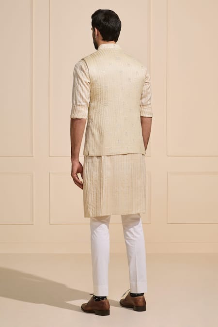 Shop Raghavendra Rathore Jodhpur Cream Silk Embroidery Textured Luxe Nehru Jacket at Aza Fashions Shop_Raghavendra Rathore Jodhpur_Cream Silk Embroidery Textured Luxe Nehru Jacket _at_Aza_Fashions