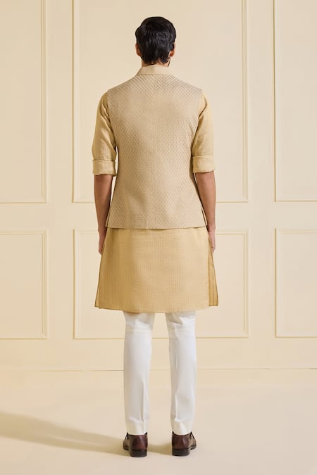 Shop Raghavendra Rathore Jodhpur Gold Silk Textured Nehru Jacket at Aza Fashions Shop_Raghavendra Rathore Jodhpur_Gold Silk Textured Nehru Jacket _at_Aza_Fashions