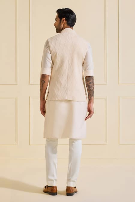 Shop Raghavendra Rathore Jodhpur Cream Viscose Suave Textured Nehru Jacket at Aza Fashions Shop_Raghavendra Rathore Jodhpur_Cream Viscose Suave Textured Nehru Jacket _at_Aza_Fashions