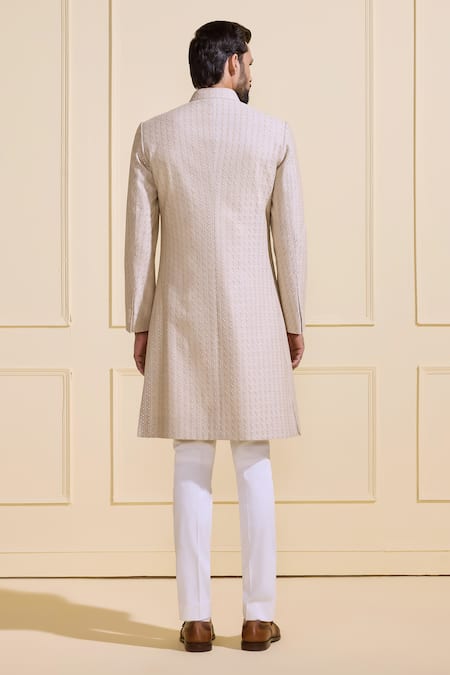 Shop Raghavendra Rathore Jodhpur Off White Silk Light-toned Embroidered Sherwani at Aza Fashions Shop_Raghavendra Rathore Jodhpur_Off White Silk Light-toned Embroidered Sherwani _at_Aza_Fashions