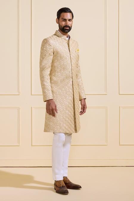 Shop Raghavendra Rathore Jodhpur Gold Silk Textured Achkan Sherwani Online at Aza Fashions Shop_Raghavendra Rathore Jodhpur_Gold Silk Textured Achkan Sherwani _Online_at_Aza_Fashions