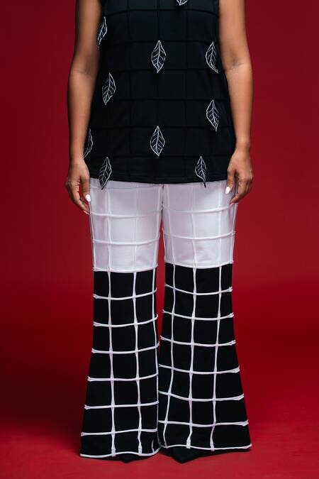 Khushboo Haran Borkar_Black Embroidery Crew Neck Nocturne Weave Co-ord Set_at_Aza_Fashions