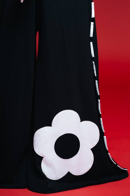 Khushboo Haran Borkar_Black Fabric Flowers V-neck Split Stem Jumpsuit_Online_at_Aza_Fashions