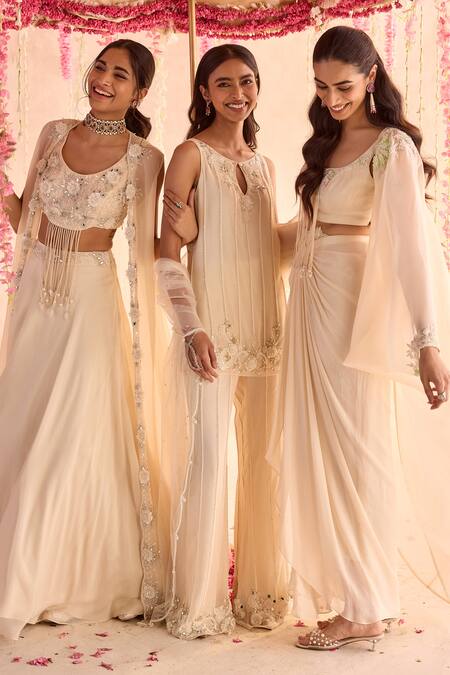 Seema Thukral Ivory Georgette Pearls Round Neck Embellished Blouse And Draped Skirt Set at Aza Fashions Seema Thukral_Ivory Georgette Pearls Round Neck Embellished Blouse And Draped Skirt Set _at_Aza_Fashions