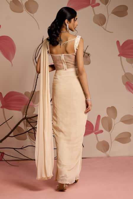 Shop Seema Thukral Ivory Georgette, Satin Sweetheart Neck Embellished Corset And Pre-draped Saree at Aza Fashions Shop_Seema Thukral_Ivory Georgette, Satin Sweetheart Neck Embellished Corset And Pre-draped Saree _at_Aza_Fashions