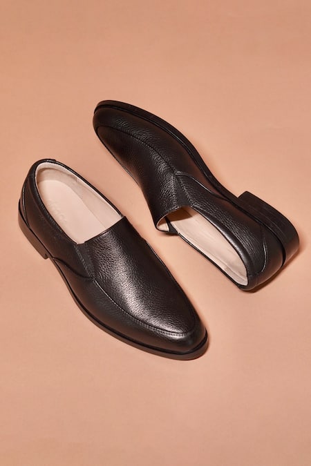 Shop Dmodot Black Milled Leather Slip-on Shoes at Aza Fashions Shop_Dmodot_Black Milled Leather Slip-on Shoes _at_Aza_Fashions