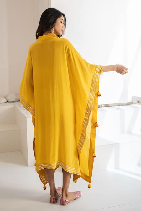 Shop Tuli Yellow Crepe Tassels V-neck Piyar Kaftan at Aza Fashions Shop_Tuli_Yellow Crepe Tassels V-neck Piyar Kaftan _at_Aza_Fashions