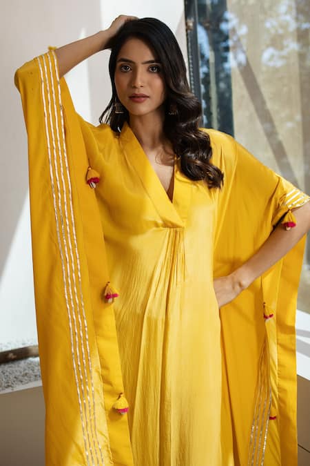 Buy Tuli Yellow Crepe Tassels V-neck Piyar Kaftan Online at Aza Fashions Buy_Tuli_Yellow Crepe Tassels V-neck Piyar Kaftan _Online_at_Aza_Fashions