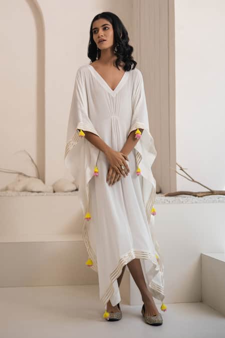Tuli Ivory Crepe Tassels V-neck Ujjar Kaftan at Aza Fashions Tuli_Ivory Crepe Tassels V-neck Ujjar Kaftan _at_Aza_Fashions