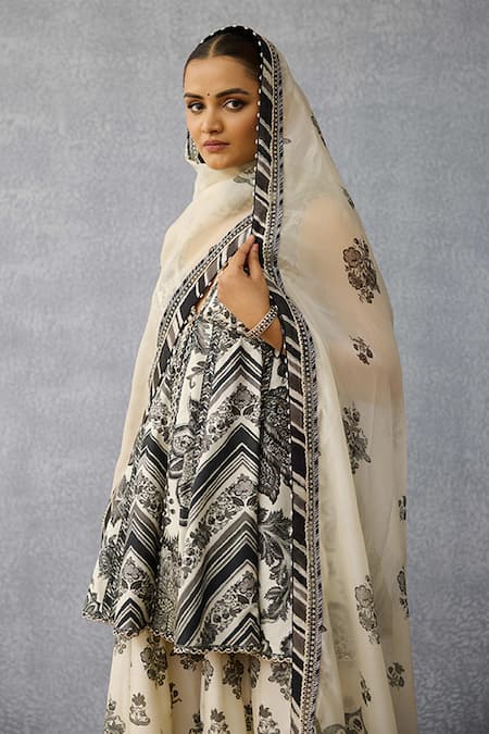 Shop Torani Black Silk Embroidery, Tassels V-neck Kalamkari Charu Sharara Set Online at Aza Fashions Shop_Torani_Black Silk Embroidery, Tassels V-neck Kalamkari Charu Sharara Set _Online_at_Aza_Fashions