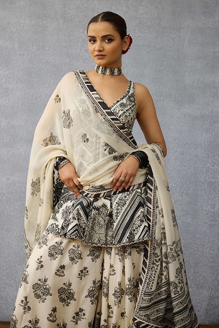 Shop Torani Black Silk Embroidery, Tassels V-neck Kalamkari Charu Sharara Set at Aza Fashions Shop_Torani_Black Silk Embroidery, Tassels V-neck Kalamkari Charu Sharara Set _at_Aza_Fashions
