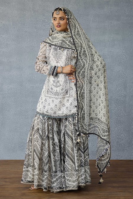 Torani_Black Georgette Embroidery, Tassels Round Neck Kalamkari Dakshaa Sharara Set _at_Aza_Fashions