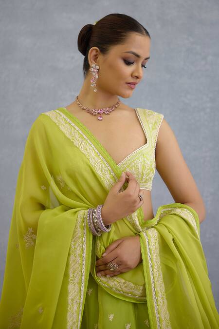 Torani Green Pom-poms, Embroidery, Tassels Sweetheart Neck Angoori Avani Lehenga Set Online at Aza Fashions Torani_Green Pom-poms, Embroidery, Tassels Sweetheart Neck Angoori Avani Lehenga Set _Online_at_Aza_Fashions