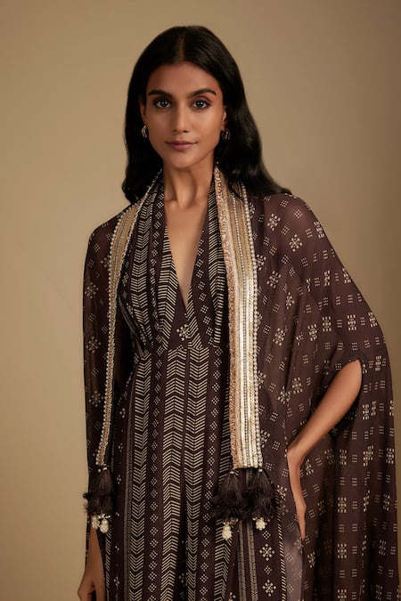 Shop Nadima Saqib Brown Crepe Halter Neck Printed Jumpsuit And Cape Set Online at Aza Fashions Shop_Nadima Saqib_Brown Crepe Halter Neck Printed Jumpsuit And Cape Set _Online_at_Aza_Fashions