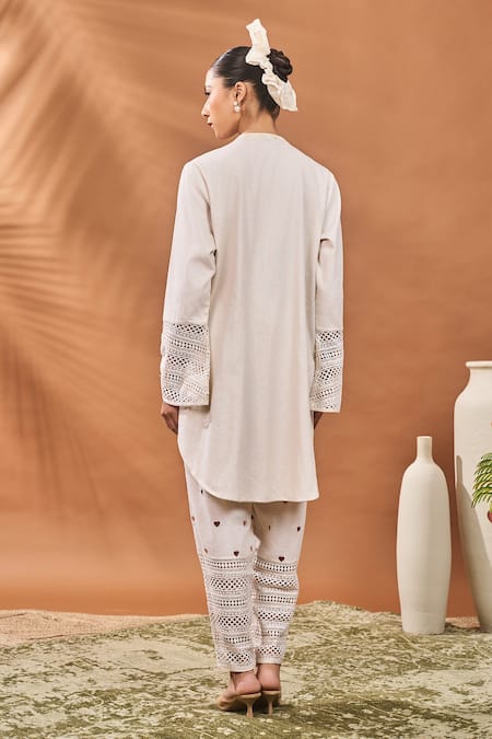 Shop Masaba Ivory Linen Embroidery Mandarin Collar Blooming Board Kurta Set at Aza Fashions Shop_Masaba_Ivory Linen Embroidery Mandarin Collar Blooming Board Kurta Set _at_Aza_Fashions